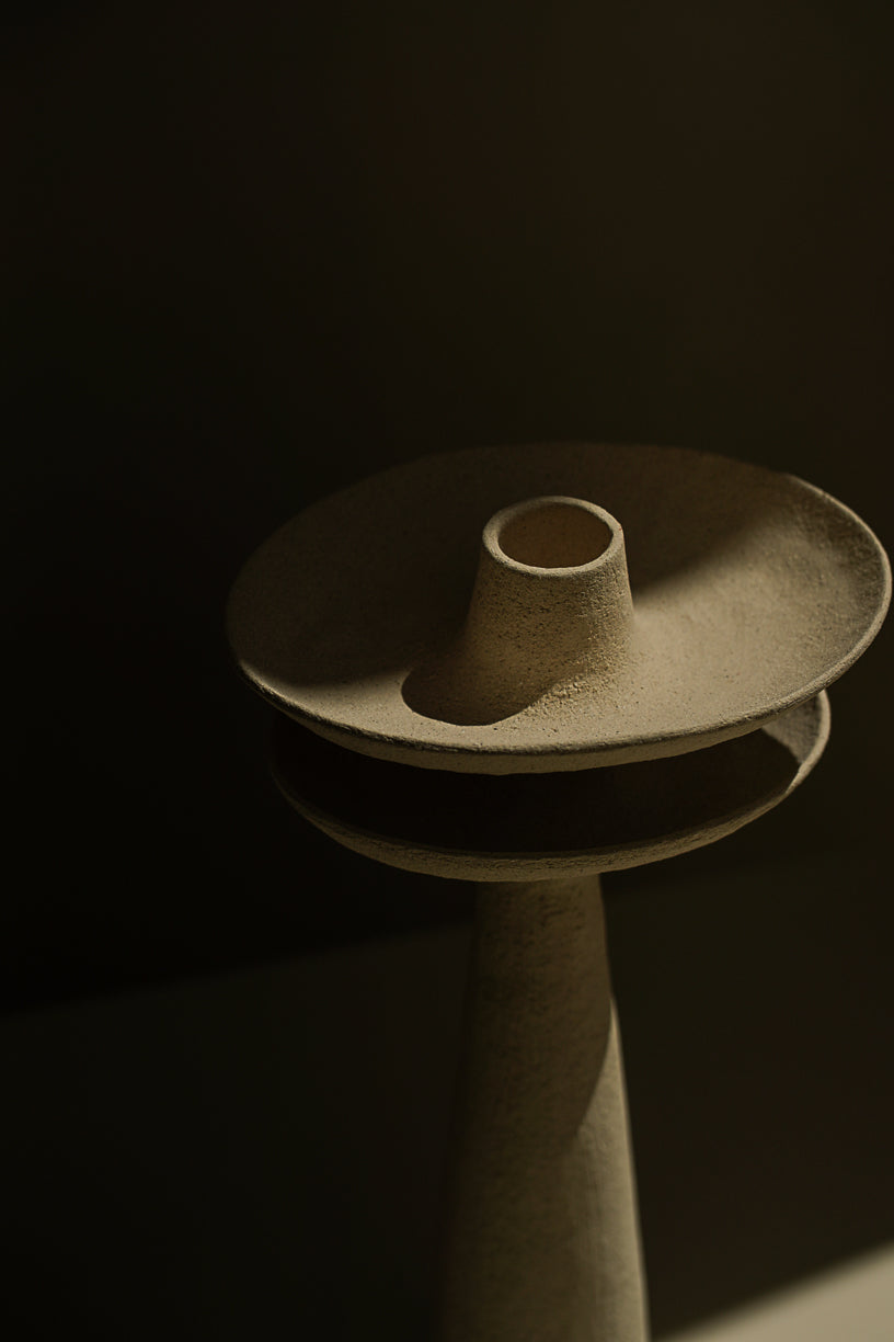 White earth candle holder