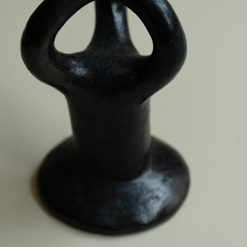 
                      
                        Pair of wrought iron candle holders
                      
                    