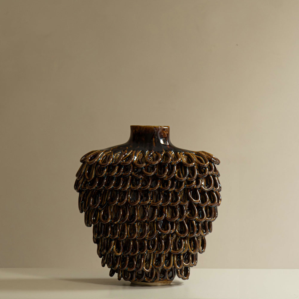 
                      
                        VASE BOUCLE
                      
                    