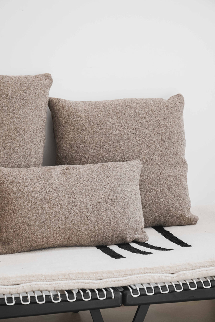 Thatched “wool cloth” cushion